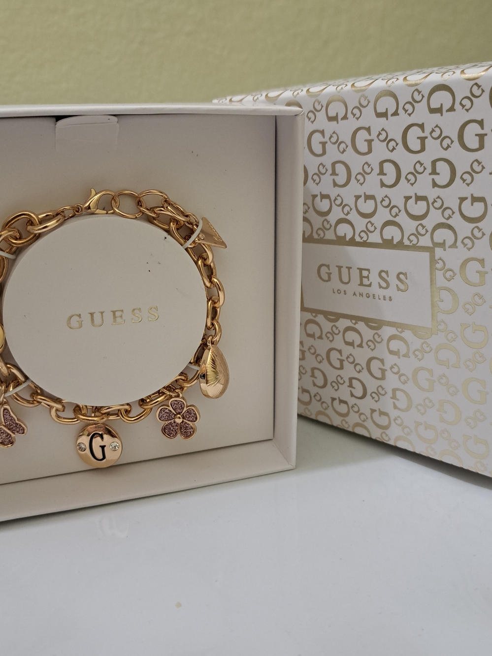 GUESS Gold-Tone Charm Bracelet with Crystal Accents - Picture 3 of 4